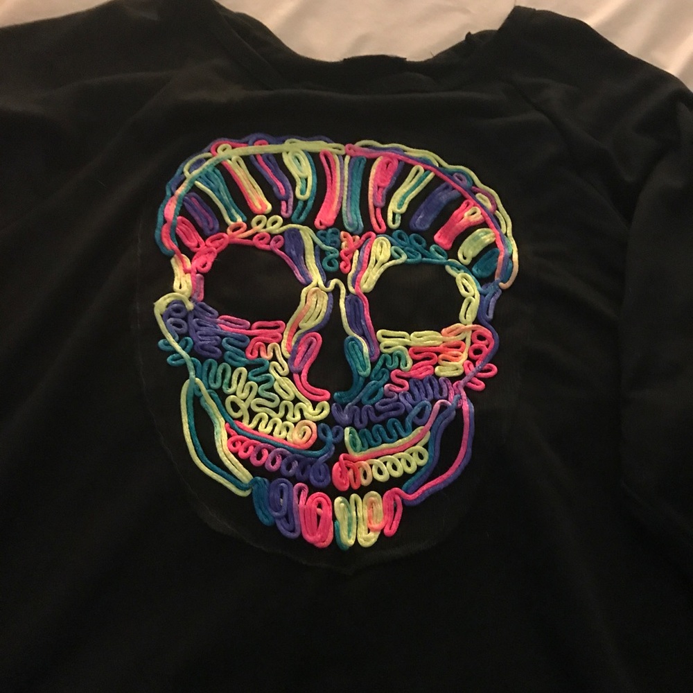 Black sweatshirt with fluorescent raised skull