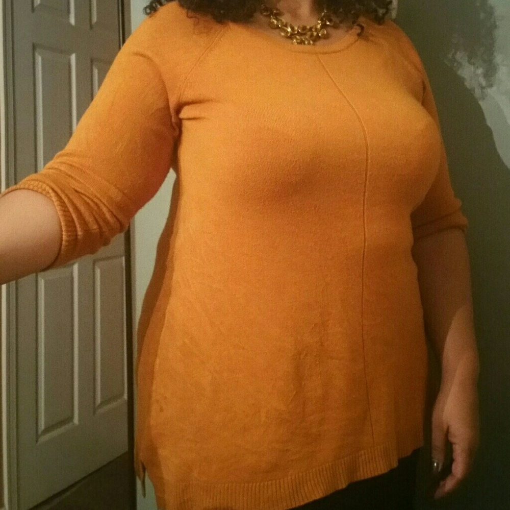 Pumpkin colored oversized sweater.