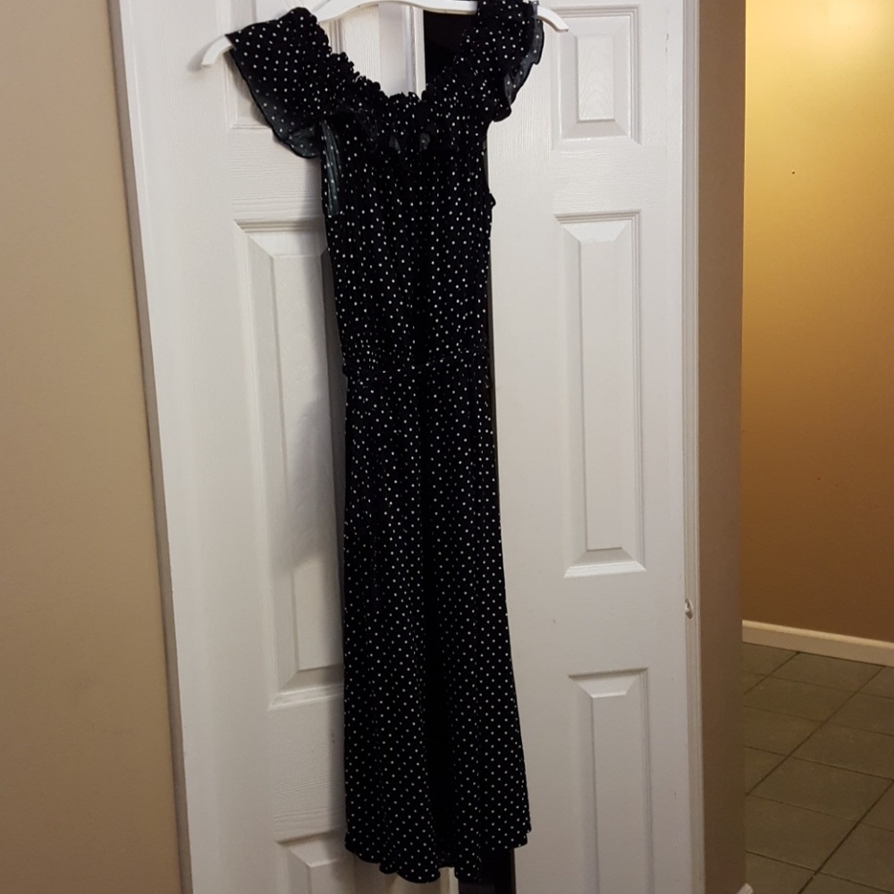 Adorable and trendy, polka dot swing dress!