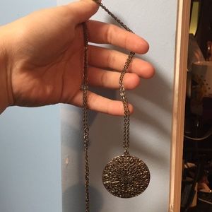 Two long necklaces one bracelet