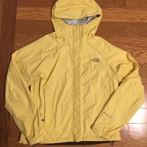 Yellow North Face rain jacket.