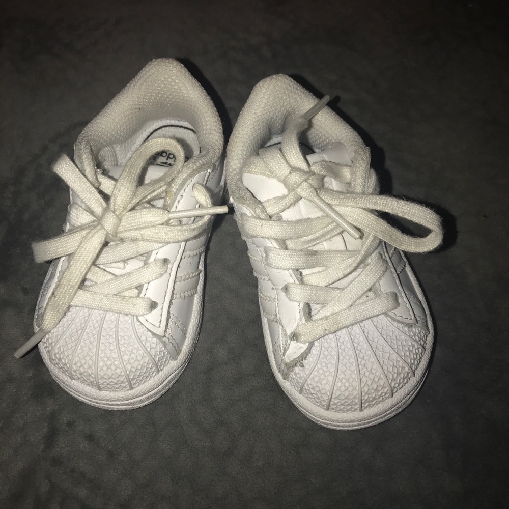 All white original superstar Adidas. Size 4c