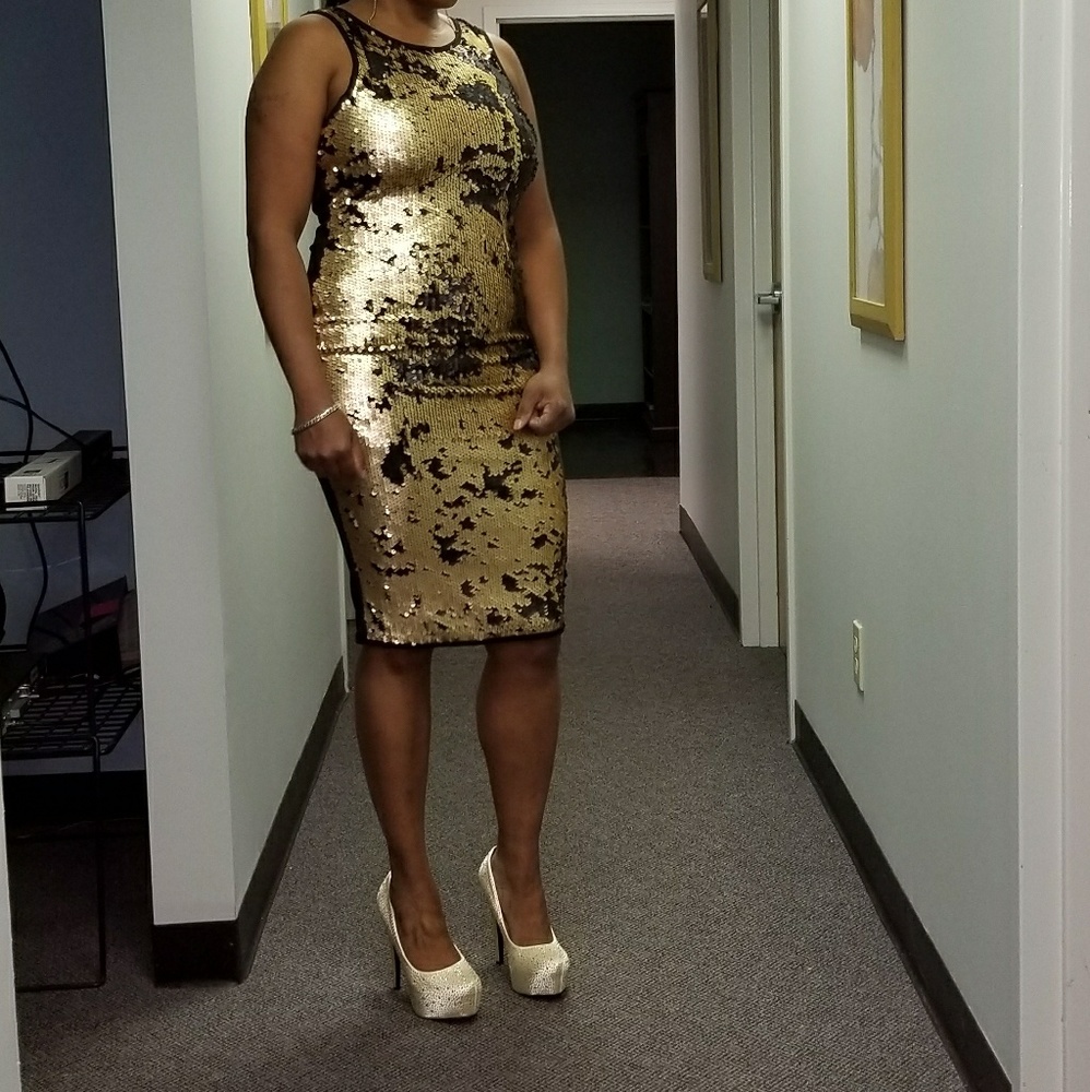 Black and gold sequins dress