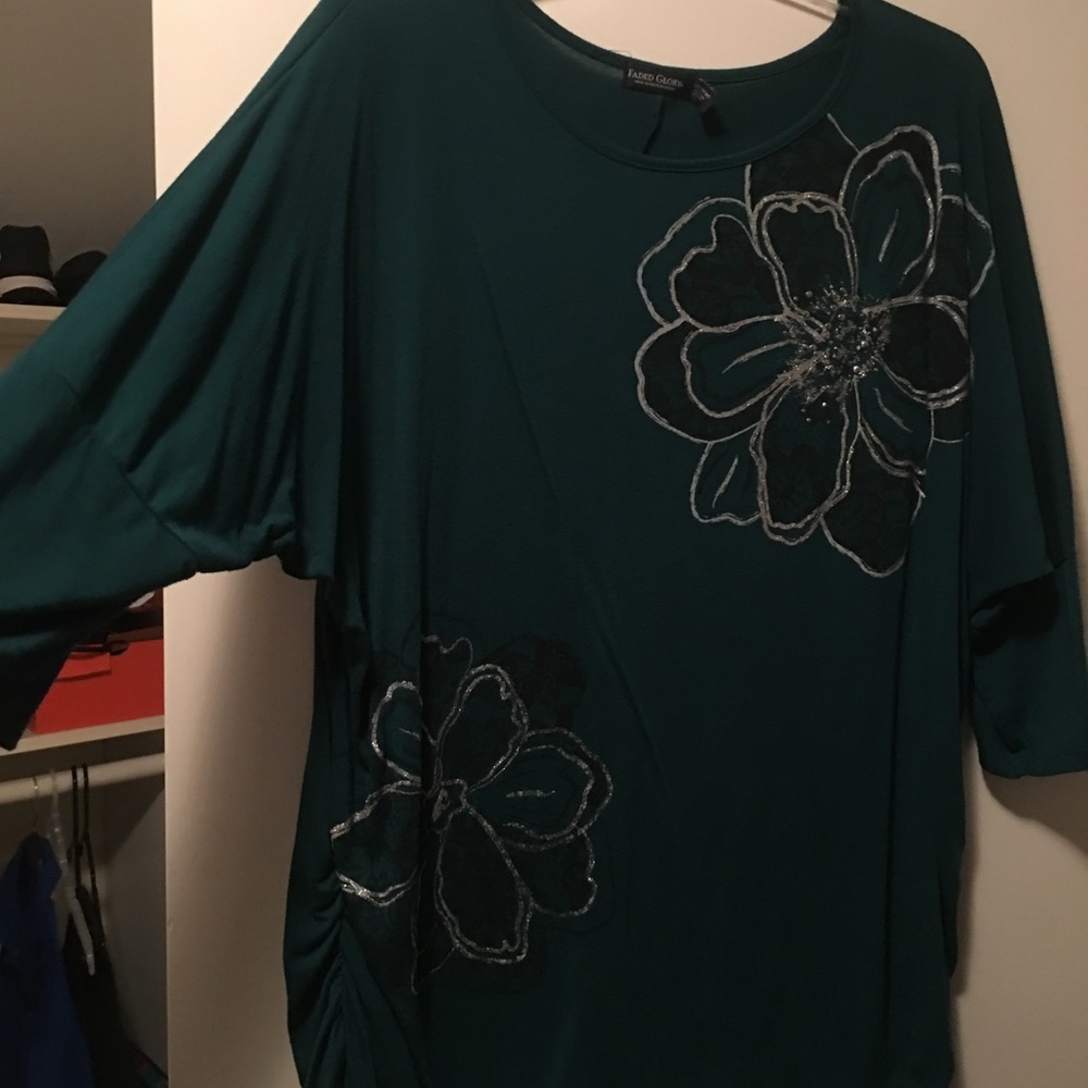 Emerald green top with floral print