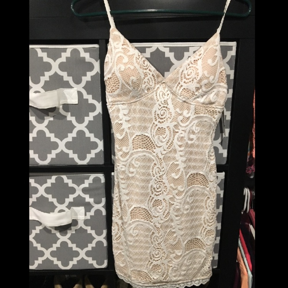 White lace dress with tan underlay