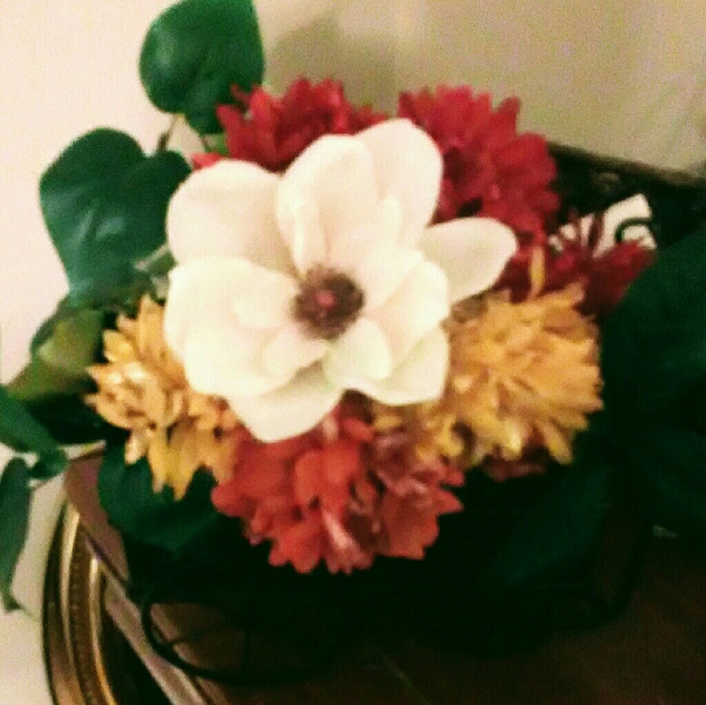 Floral arrangement in a buggie
