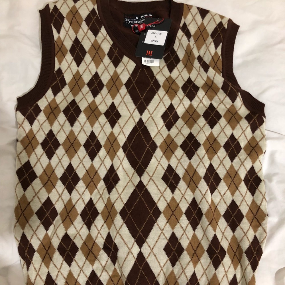 A royal prestige sleeveless sweater vest new.