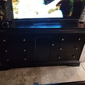 Bed and stand mirror