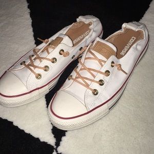 White slip on Converse low tops