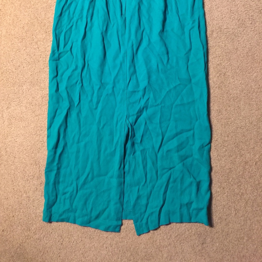 Turquoise long skirt with a slit