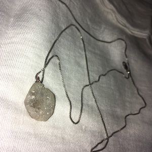 Raw crystal on a silver chain
