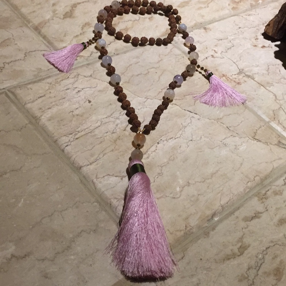 Hand tied rose quartz and wood necklace