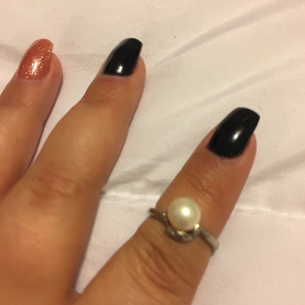 Small pearl ring on sterling silver