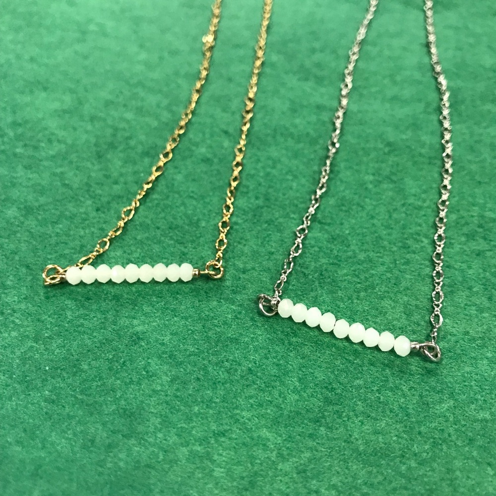 Chain necklaces with jewel charm detail