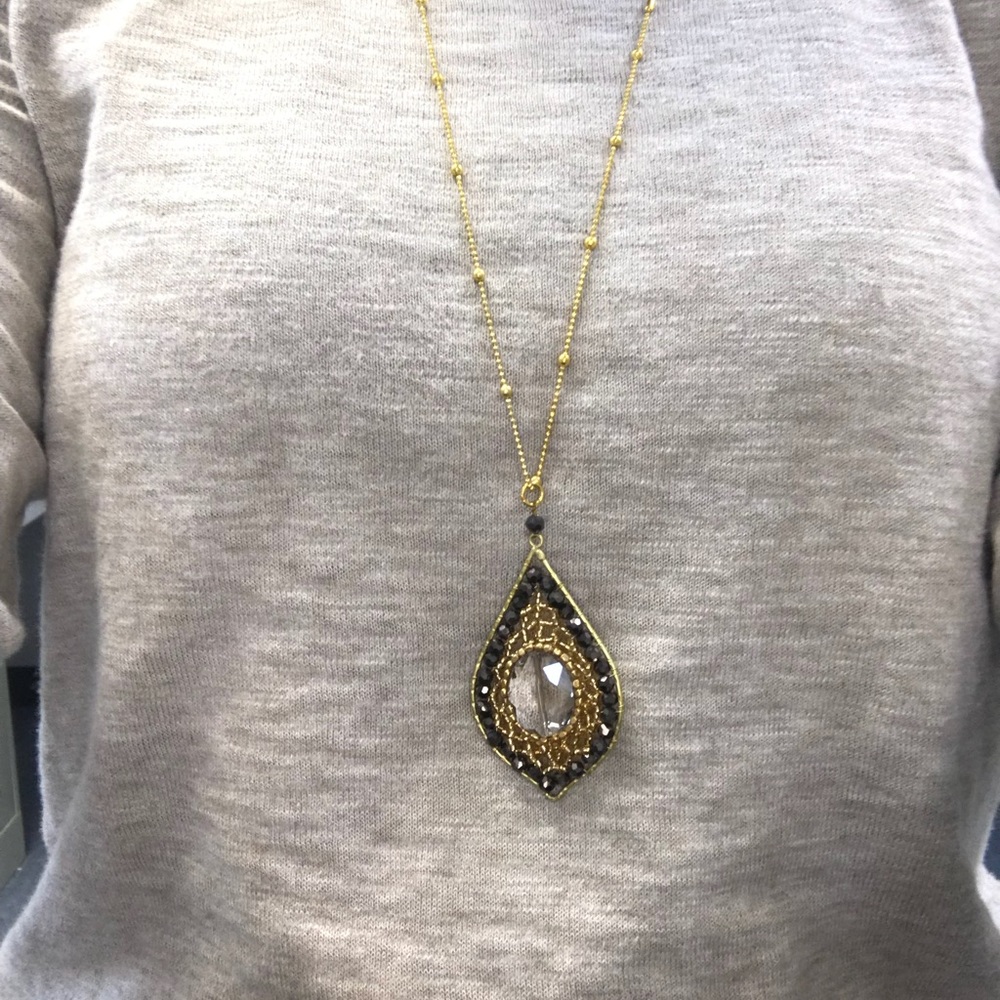 Long jeweled charm necklace