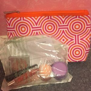 Clinique makeup + bag