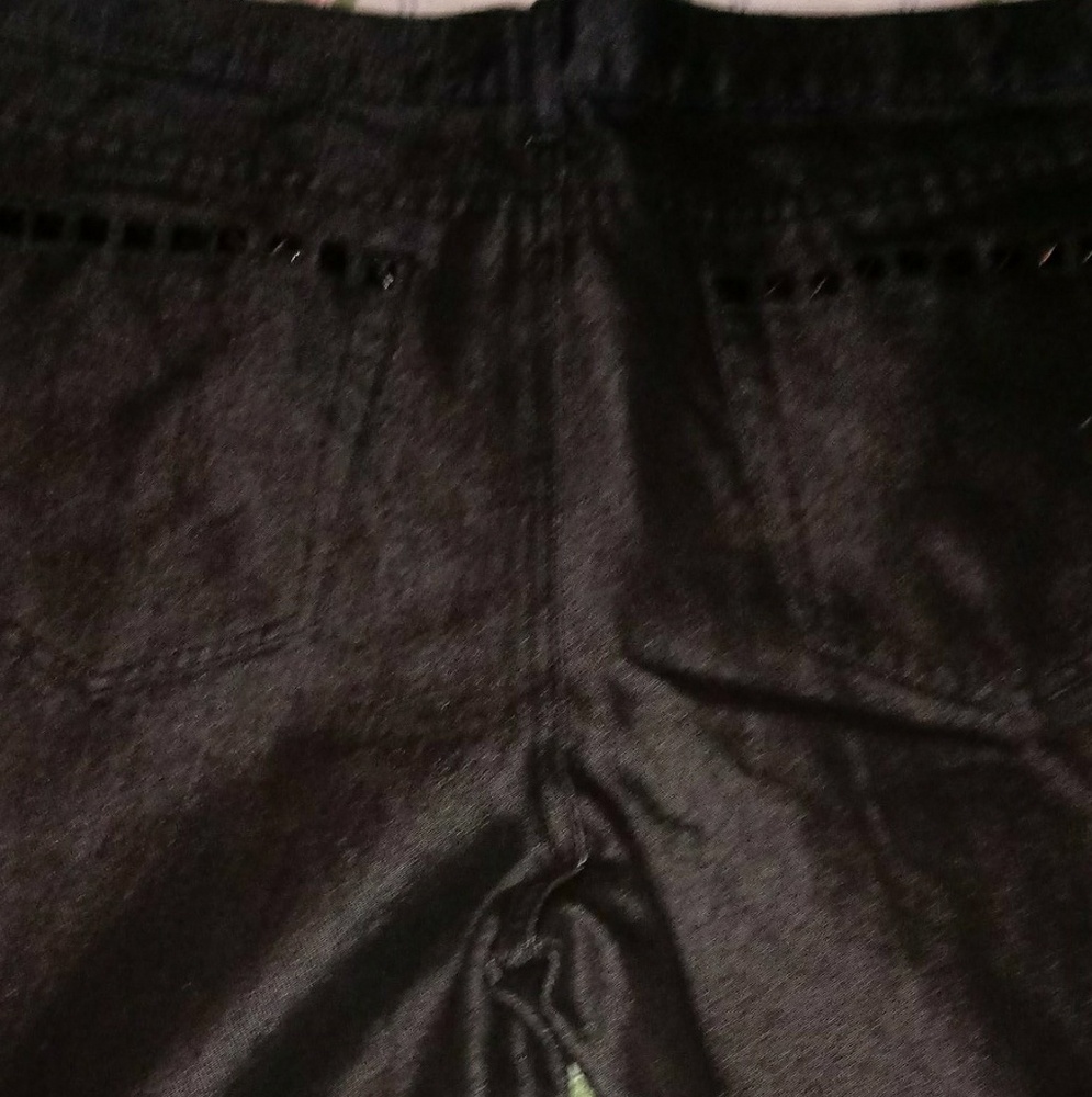Never worn black metalic like jeans with black stu