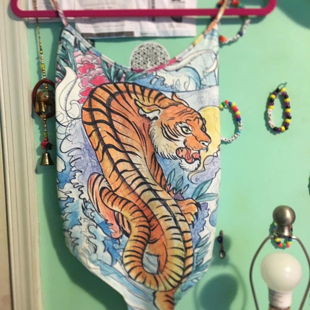 Topshop tiger body suit. Never worn.