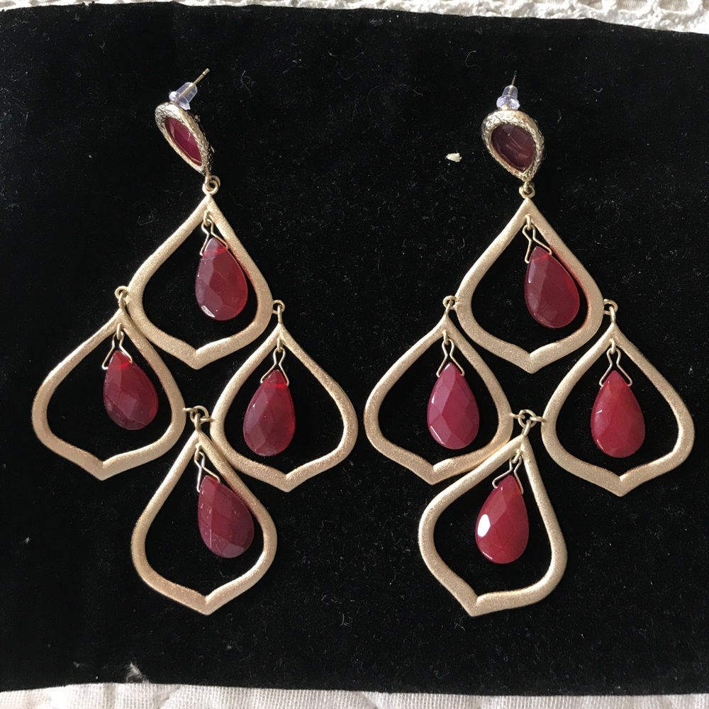 Boho style red statement earrings.