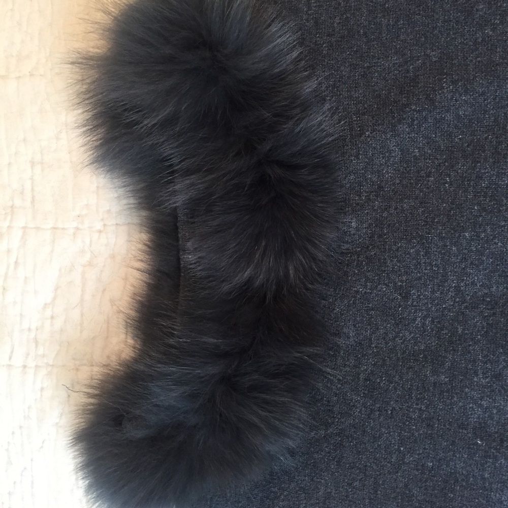 Brand new Wool/fur poncho sweater.