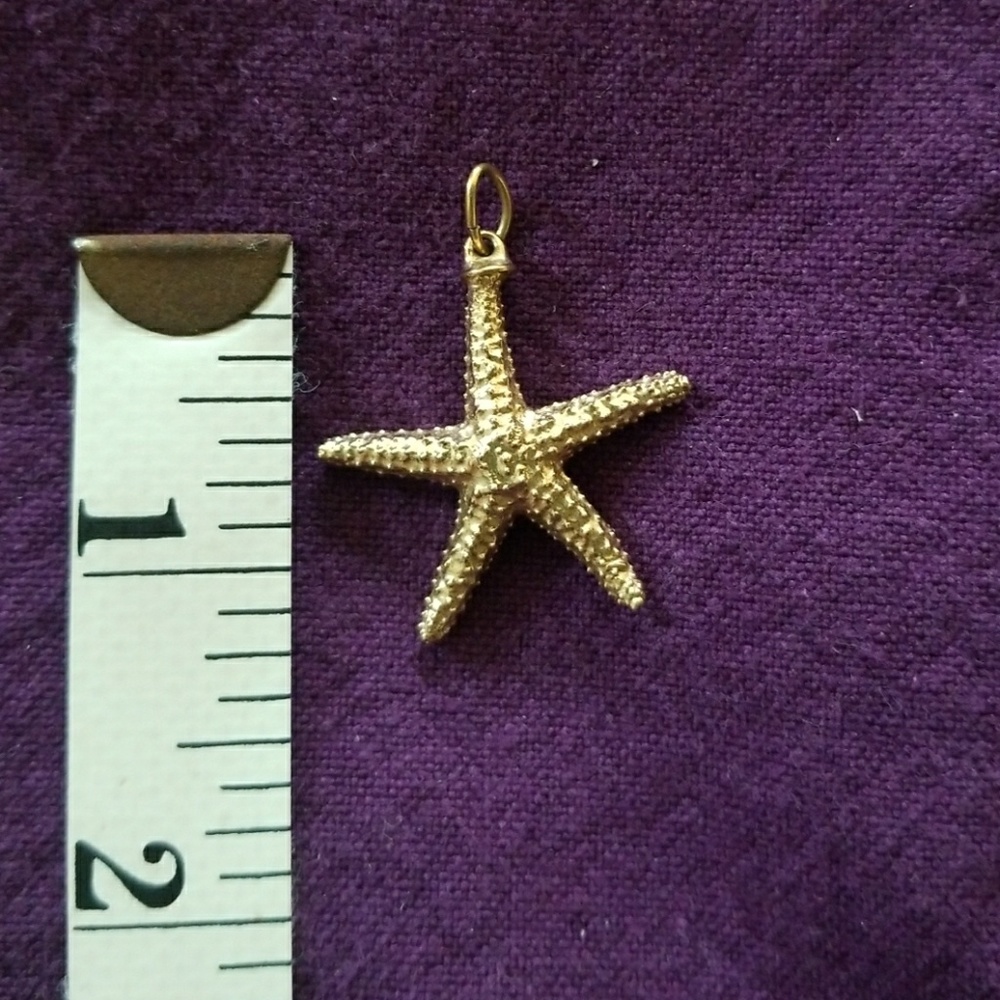 Gold starfish pendant