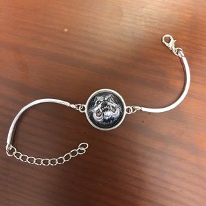 Angry Bulldog Biting its Chain Bracelet