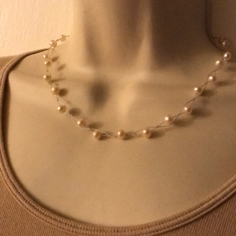 Genuine floating pearl necklace