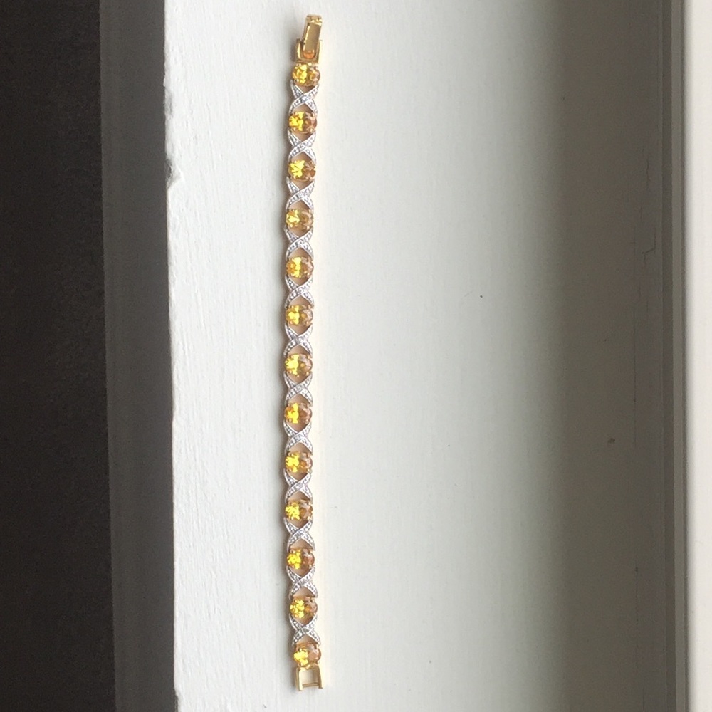Faux yellow stone and diamond bracelet