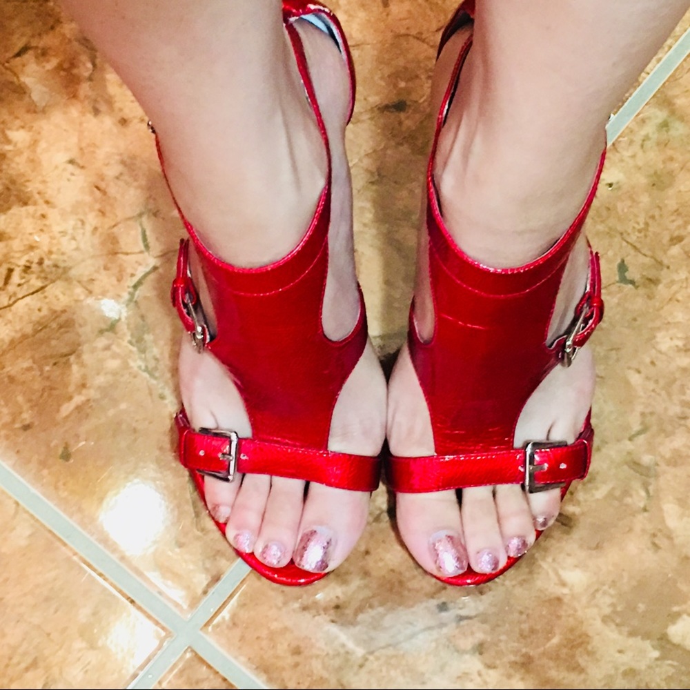 Carlos Santana red high heels