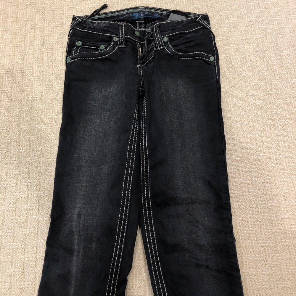 Stitches black jean denims with white stitching