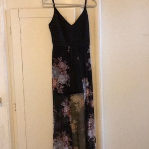 Beautiful black romper with flowy back