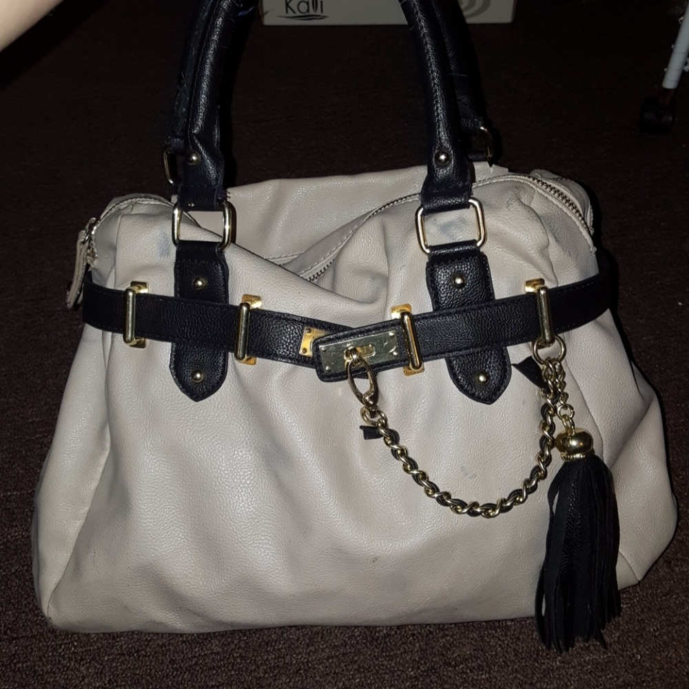 Steve madden purse with some slight defects.