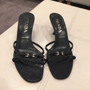 Size 37 (7 US). Black Prada kitten heel sandals.