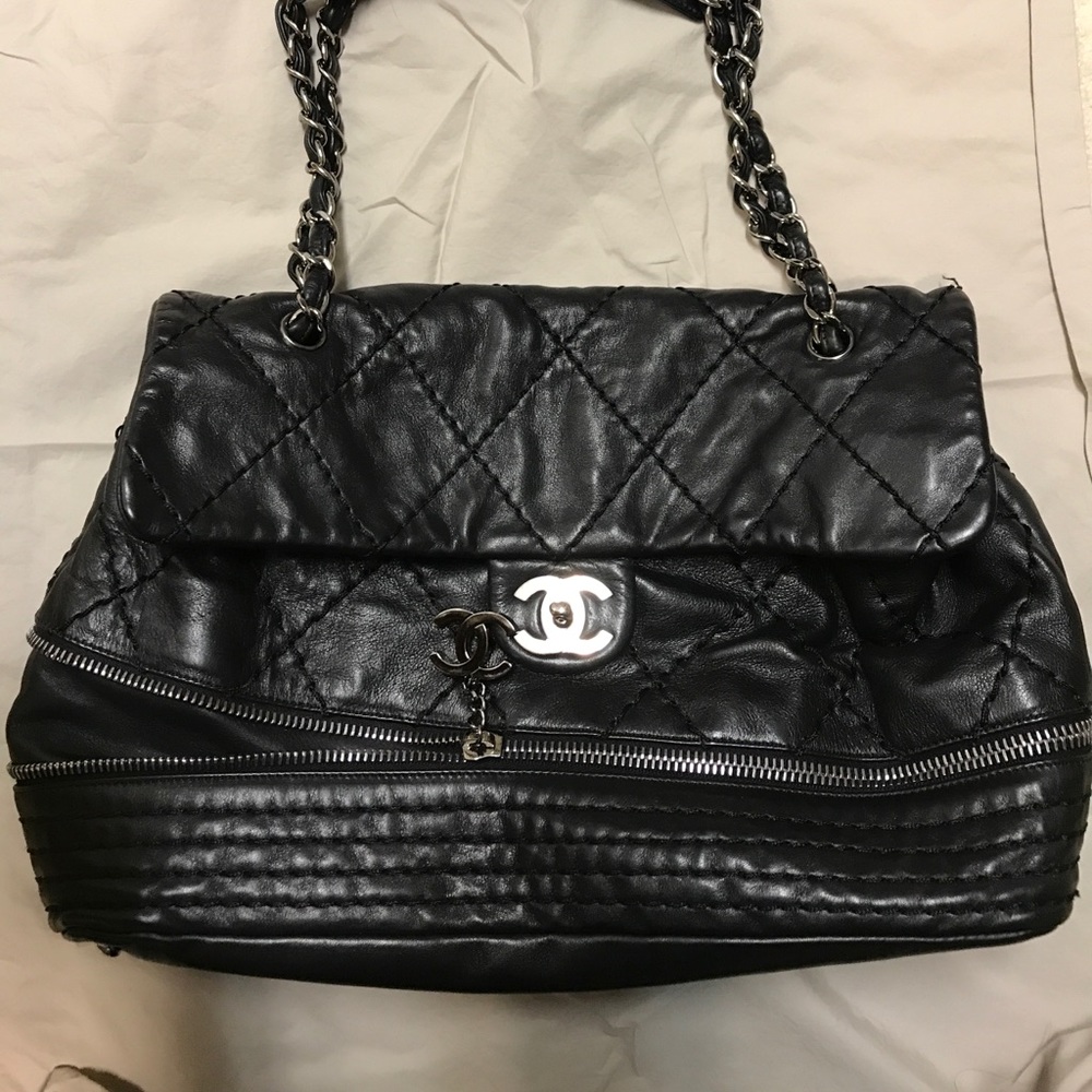 Authentic quilted Chanel Zipper Bag