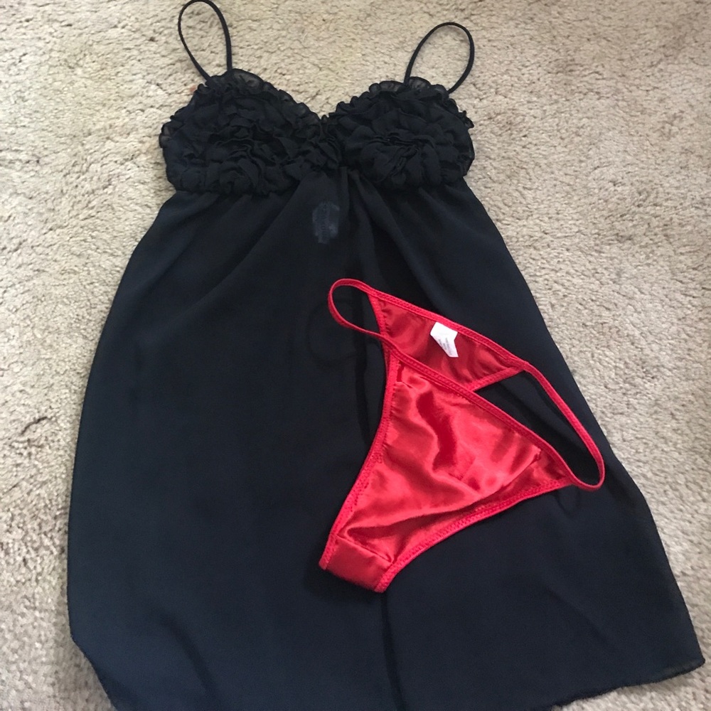 Black lingerie with red thong