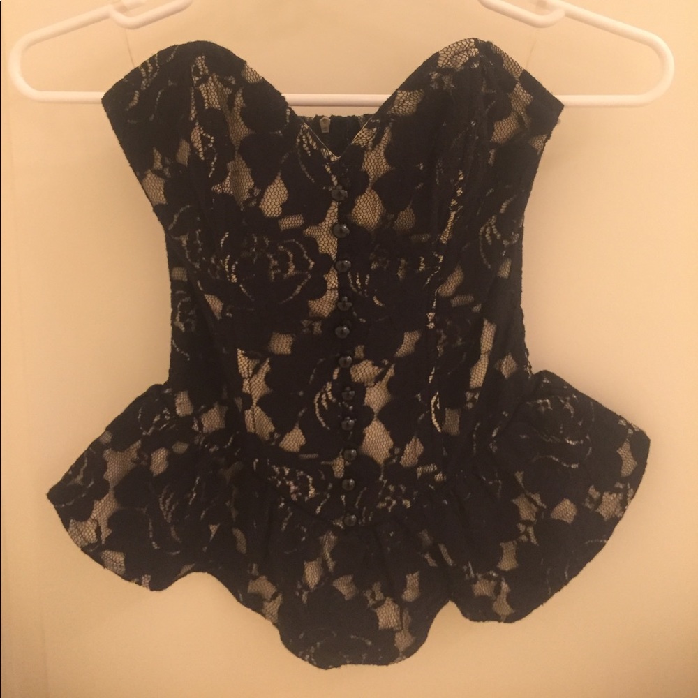 SOLD// Lacey black corset with peplum bottom