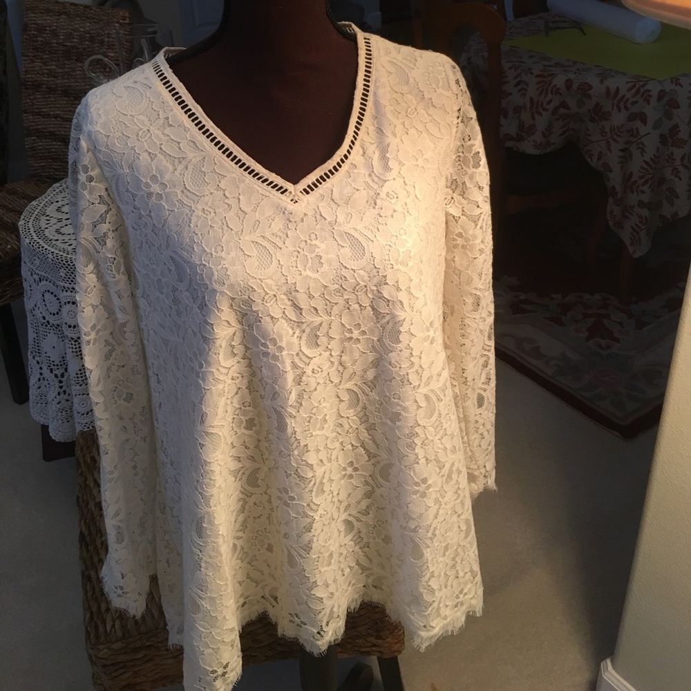 Brand new never worn lace top with the neck