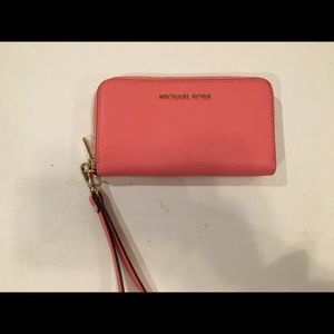 Sold- Michael Kors wristlet- dark salmon color