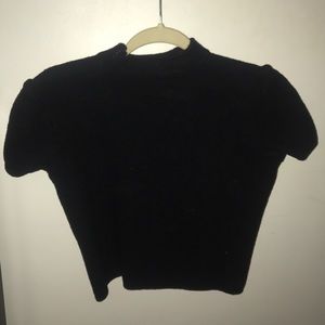A wool turtleneck crop top