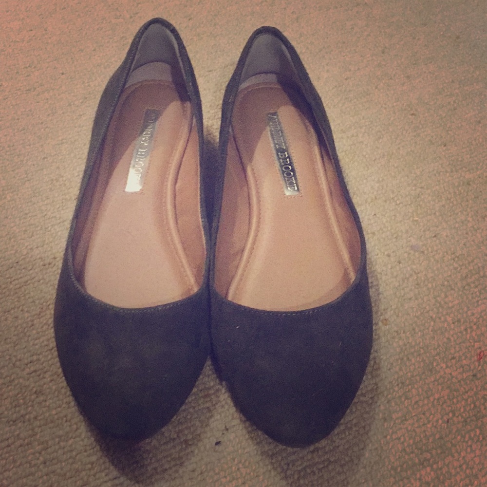 Dark green suede flats.