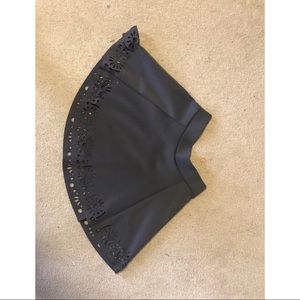 Grey circle skirt with cut outs on bottom