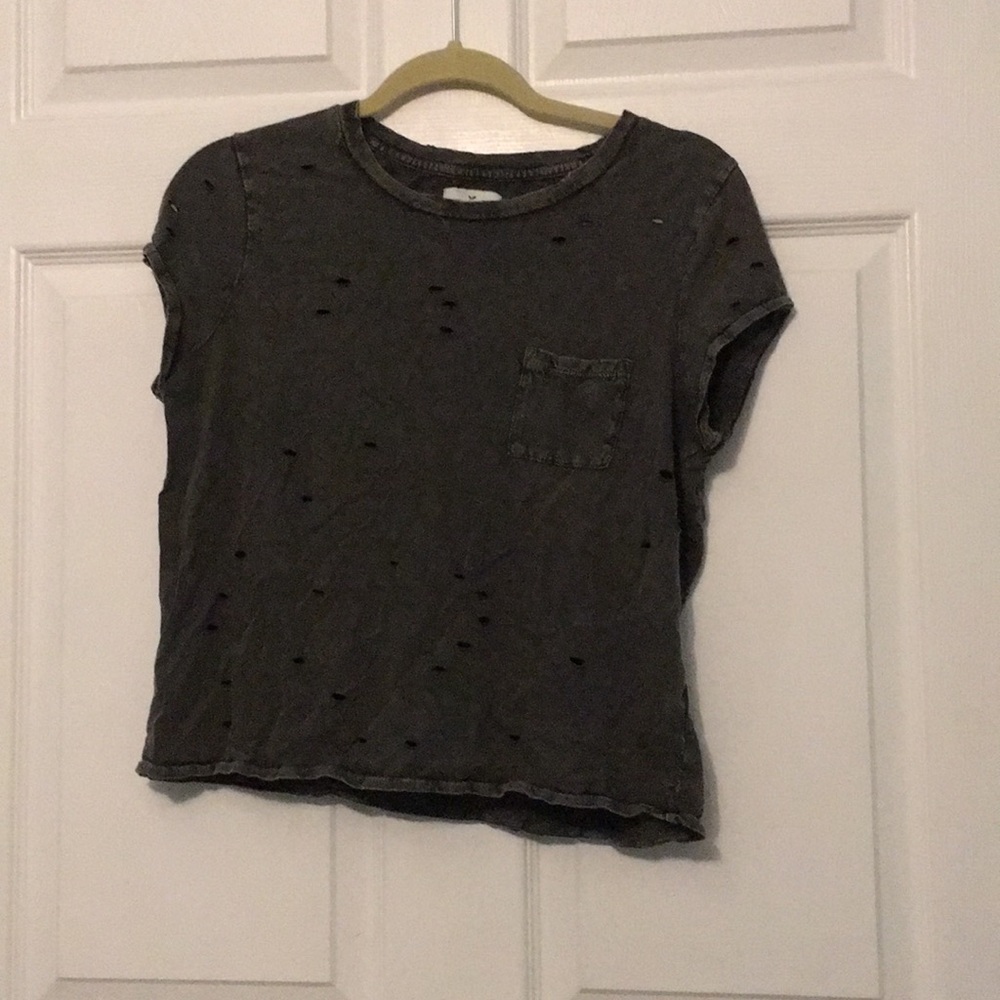 Distressed slightly cropped loose fitted tee