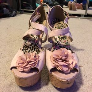 Worn pink wedges