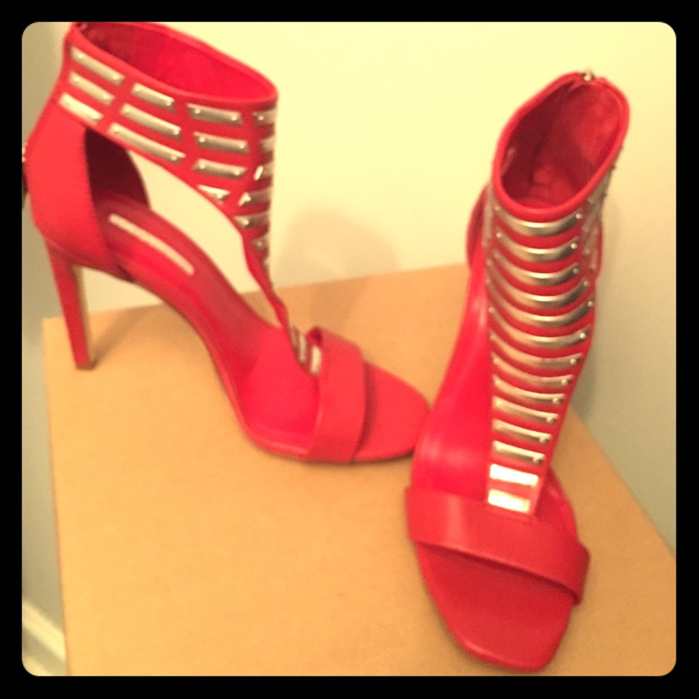 Red sandal heel with silver accent.