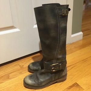 Knee high black leather slip-on boots