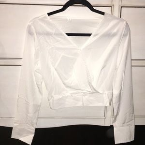 Cropped white v neck blouse
