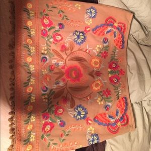 Tan embroidered skirt.