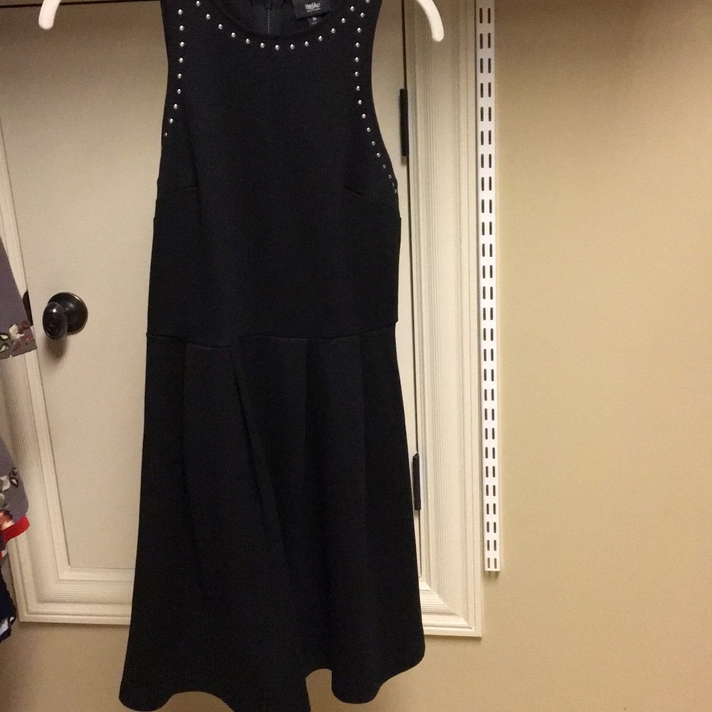 Black outlined with silver studs