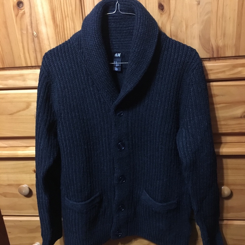 A 100% wool cardigan sweater