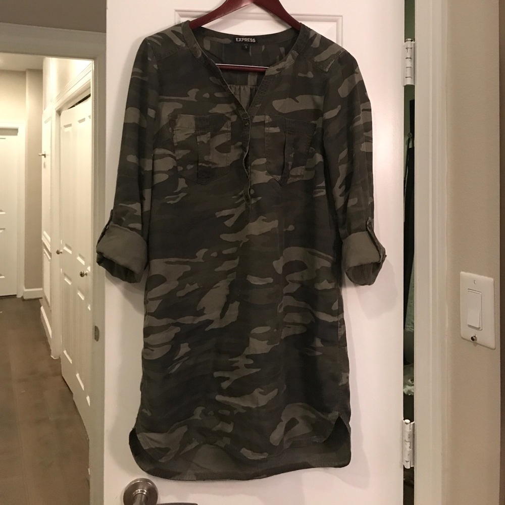 Camp dress. Side slit is high mid thigh.